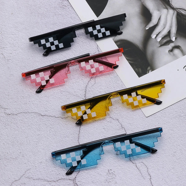 A collection of pixel mosaic sunglasses in various colors including black, pink, yellow, and blue shades