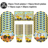 A set of yellow construction vehicle themed birthday party tableware including plates, cups, napkins, and napkins.