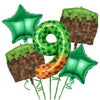 A set of green miner theme party decorations including balloons and tableware.