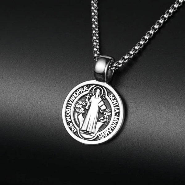 Silver stainless steel medal necklace featuring a depiction of Saint Benedict