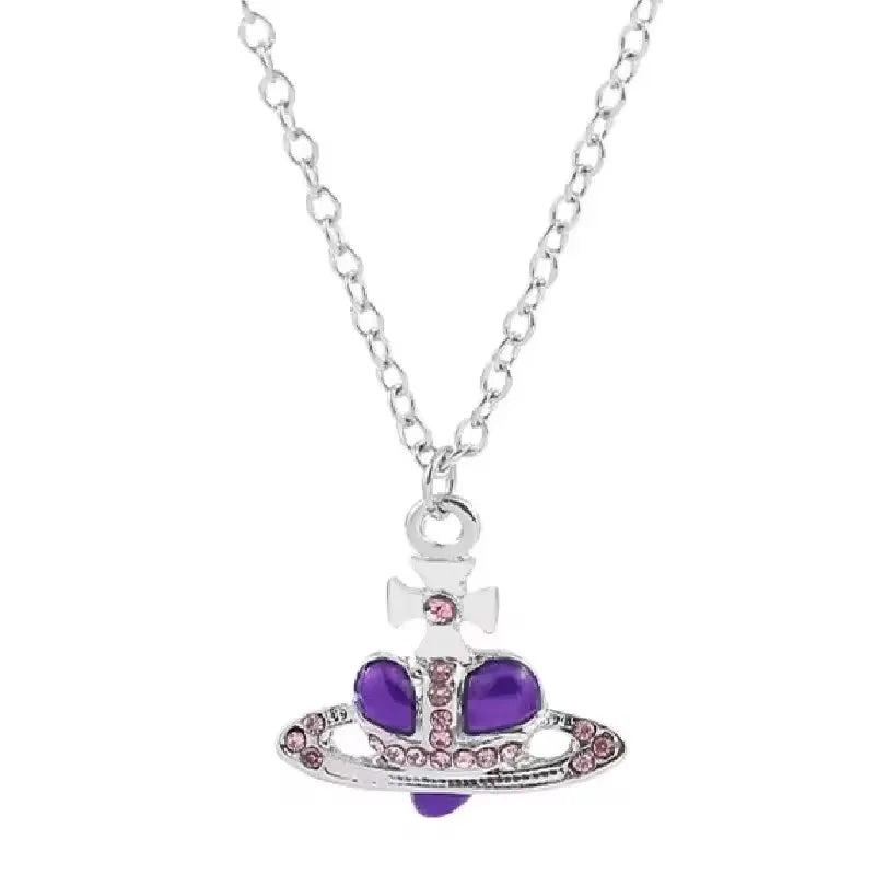 Silver pendant necklace featuring a purple gemstone set in a Saturn design.