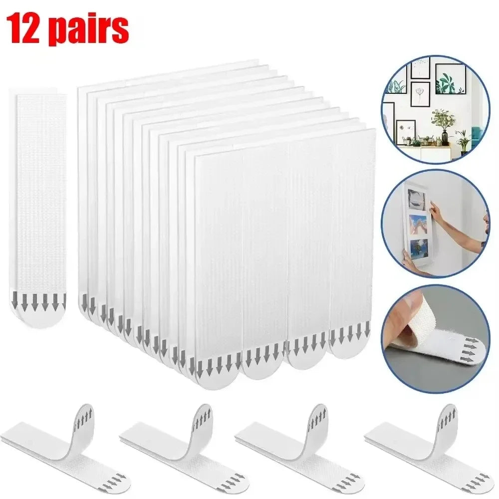 Twelve pairs of white reusable double-sided adhesive picture hanging strips shown in various angles.