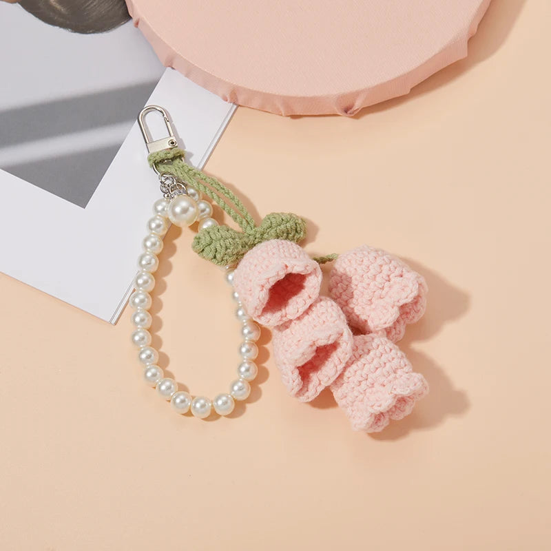 Handmade crocheted pink and green flower keyring charm with pearl beads