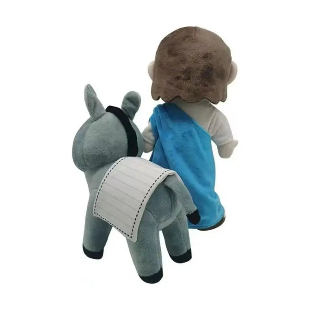 A plush doll set featuring Jesus and Mary figures with soft fabric clothing.