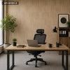 A modern office desk setup featuring a laptop, monitor, and ergonomic chair against a wood grain wall.
