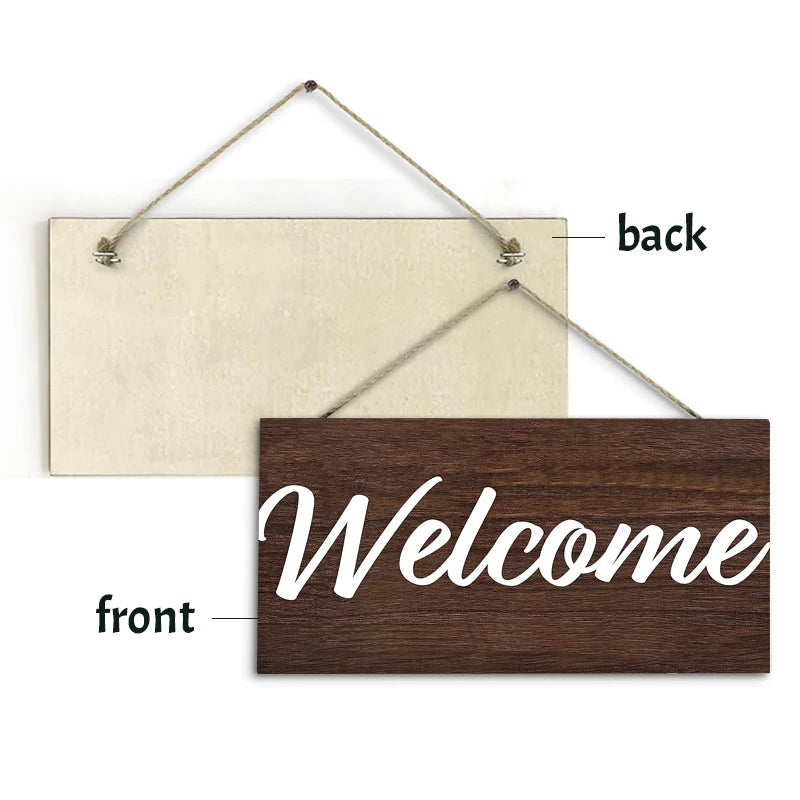 A rustic wooden welcome sign with 'Welcome' engraved on the front and a blank back, displayed with twine for hanging.