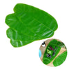 A set of five green tropical banana leaf coasters used as heat-resistant, waterproof table protectors.