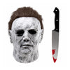 A realistic latex mask of Michael Myers with a bloody scar detail and a black blade.