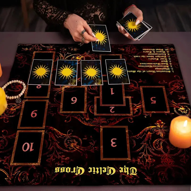 A dark altar cloth featuring a Celtic Cross design with numbered compartments for tarot and divination tools.