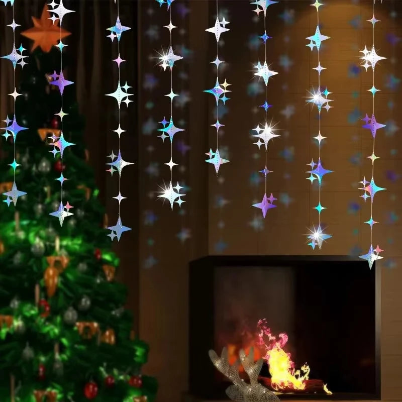 A Christmas tree decorated with a glittering star and polka dot garland hanging in front of a fireplace.