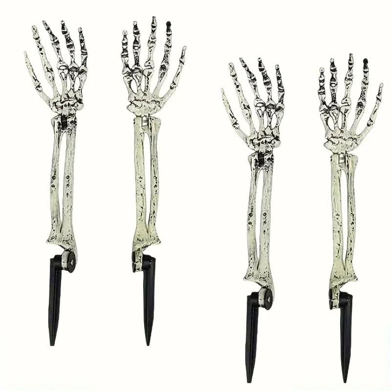 A set of Halloween skeleton bone garden stakes featuring skull and hand designs.