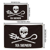 Black tapestry featuring a skull and crossbones with a pirate sword and anchor design labeled Sea Shepherd