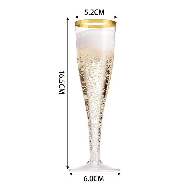 A tall, clear plastic champagne flute with a gold rim and stem, measuring 16.5cm in height.