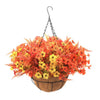 Realistic artificial orange and yellow flowers in a hanging basket