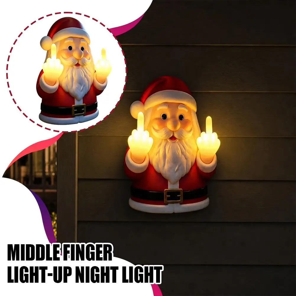A glowing Santa Claus night light with a beard making a middle finger gesture, mounted on a dark wooden surface.