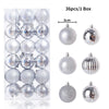 A box containing 36 silver and clear glass Christmas tree ornament balls.