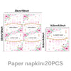 Pink floral pattern paper napkins with sweet baby designs for a baby shower
