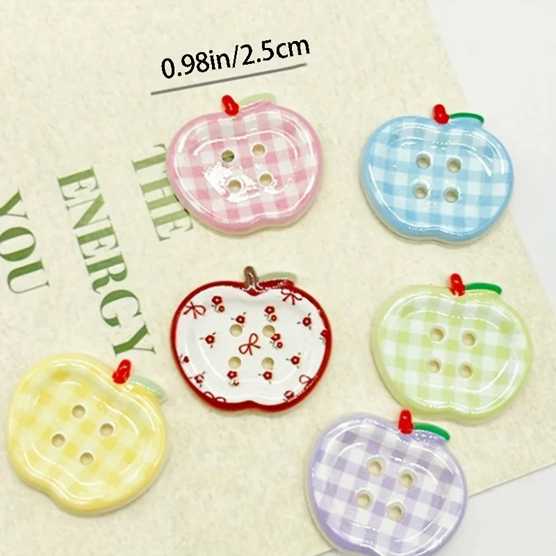 A collection of eight heart-shaped checkered fridge magnets in various pastel colors like pink, blue, yellow, and green.