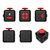 A set of four black fidget cube stress relief toys with red tops and various internal mechanisms.