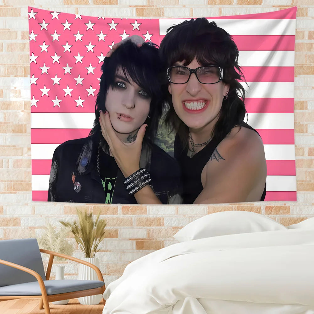 A wall hanging featuring a portrait of Jake Webber and Johnnie Guilbert set against an American flag background.