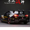 A black Nissan GTR alloy model car is displayed against a dark background with Japanese text above it.