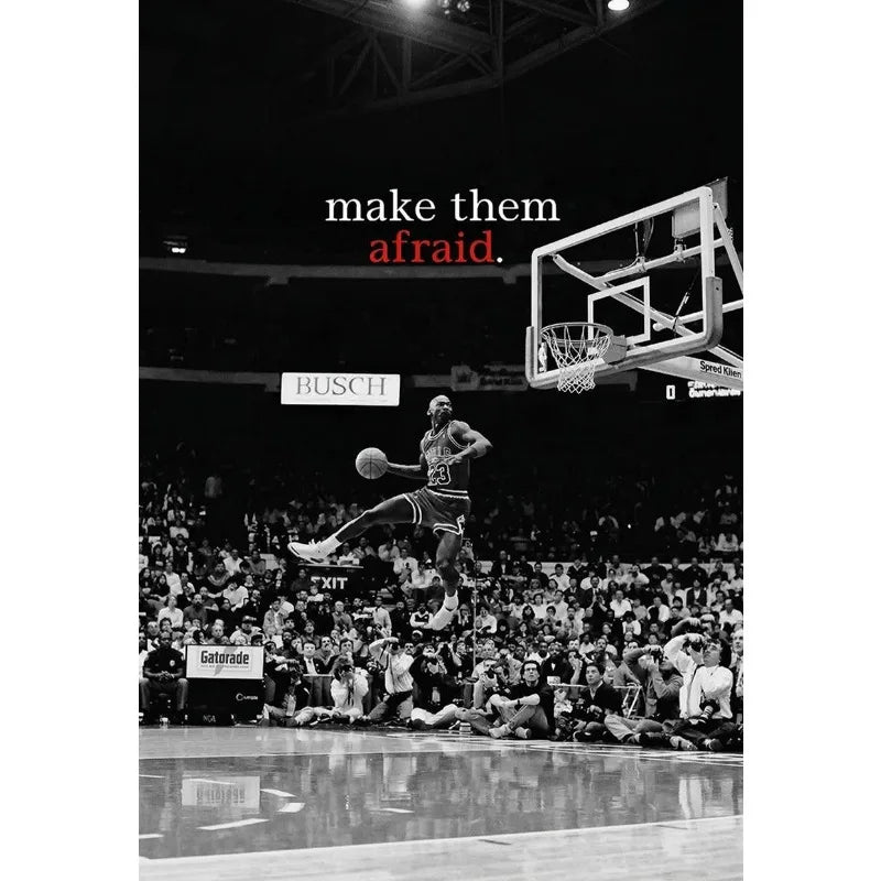 Black and white photo of a basketball player dunking during a game, titled Make Them Afraid.