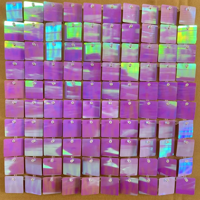 A grid of iridescent sequin shimmer wall panels in various shades of purple and green.
