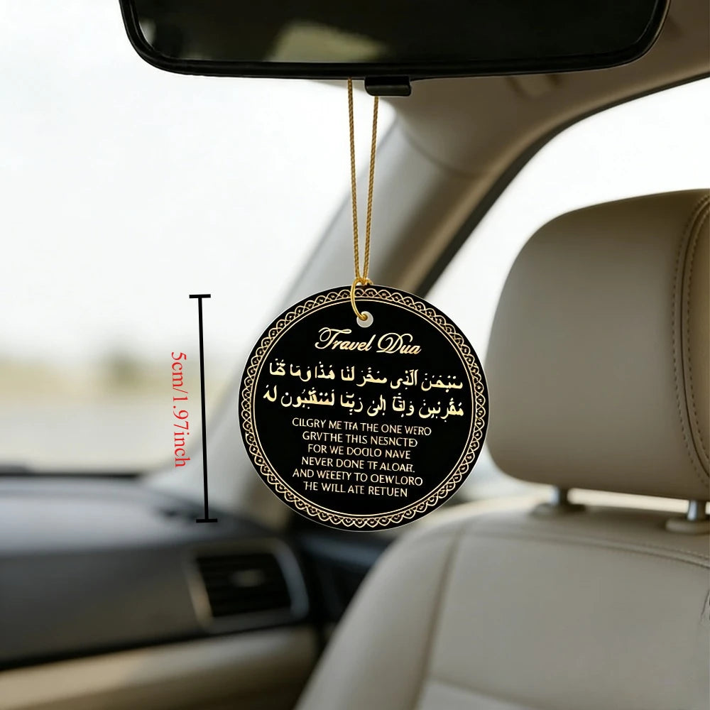 A round leather tag with Arabic and English text hangs from a key chain inside a car.