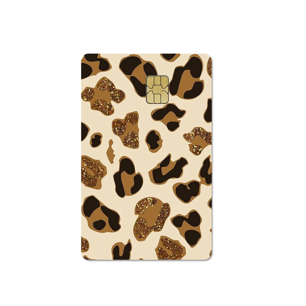 A card cover featuring a repeating pattern of brown and gold leopard print stickers.