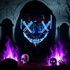 A dark figure wearing a hood and a glowing blue mask with neon wire details, set against a spooky background with purple flam