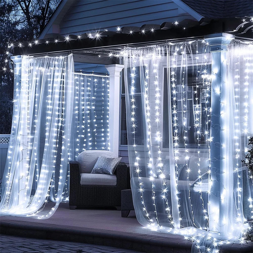 Blue fairy curtain string lights draped over a window for indoor and outdoor decor.