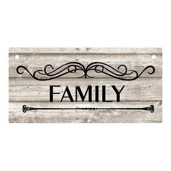 Rustic wooden hanging sign with the word FAMILY carved into the wood.