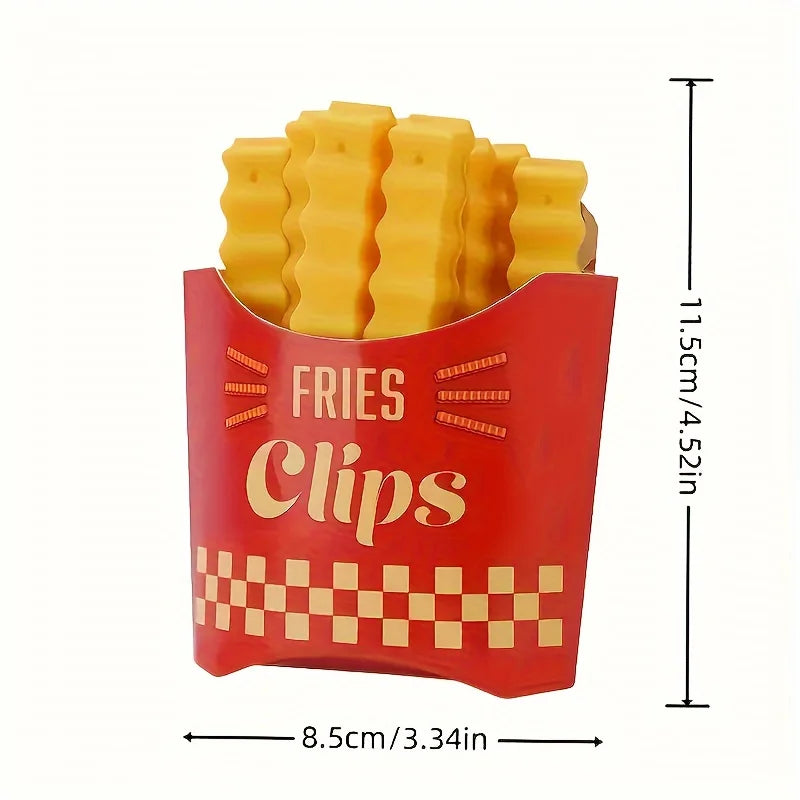 A container of yellow French fry shaped sealing clips with a red lid and checkered pattern.