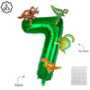 Green foil balloon shaped like the number 7 with attached dinosaur decorations and a 32-inch banner.