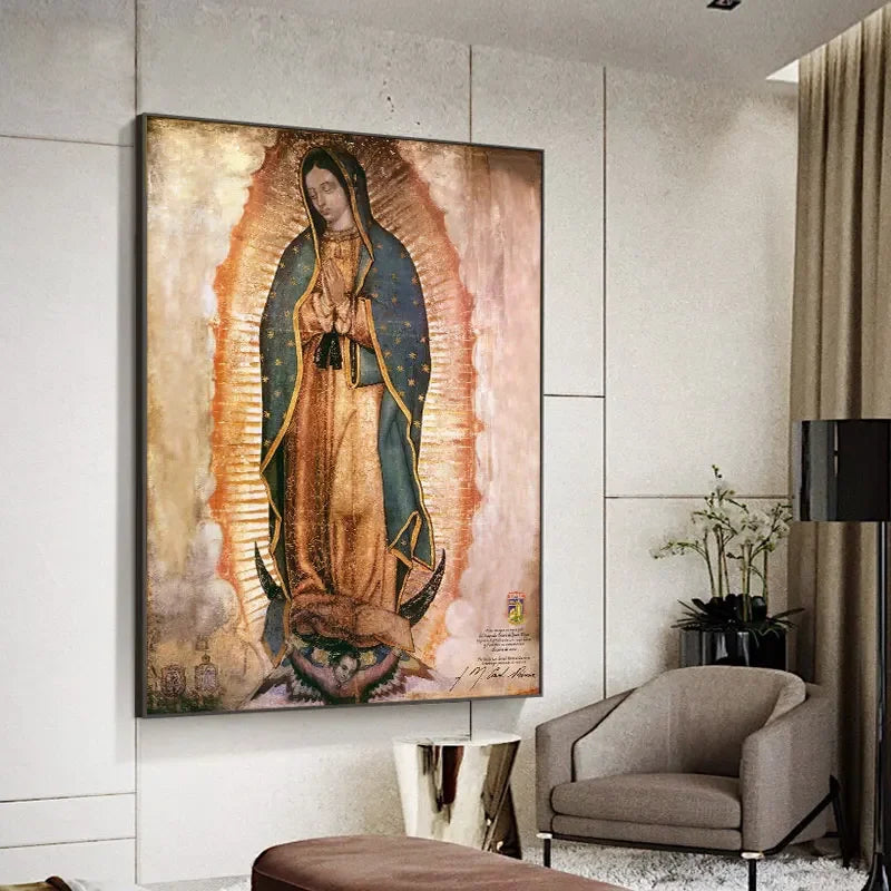 A vertical canvas painting of Our Lady of Guadalupe with a golden halo and rich earth tones hanging on a white wall.