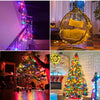 A collection of festive holiday lights, including a glowing Christmas tree and an ornate golden hanging chair.