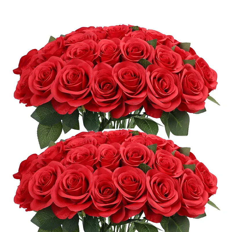 A dense bouquet of vibrant red artificial silk roses.