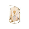 Elegant metal and glass candle holder with a wire frame and a clear glass cylinder.