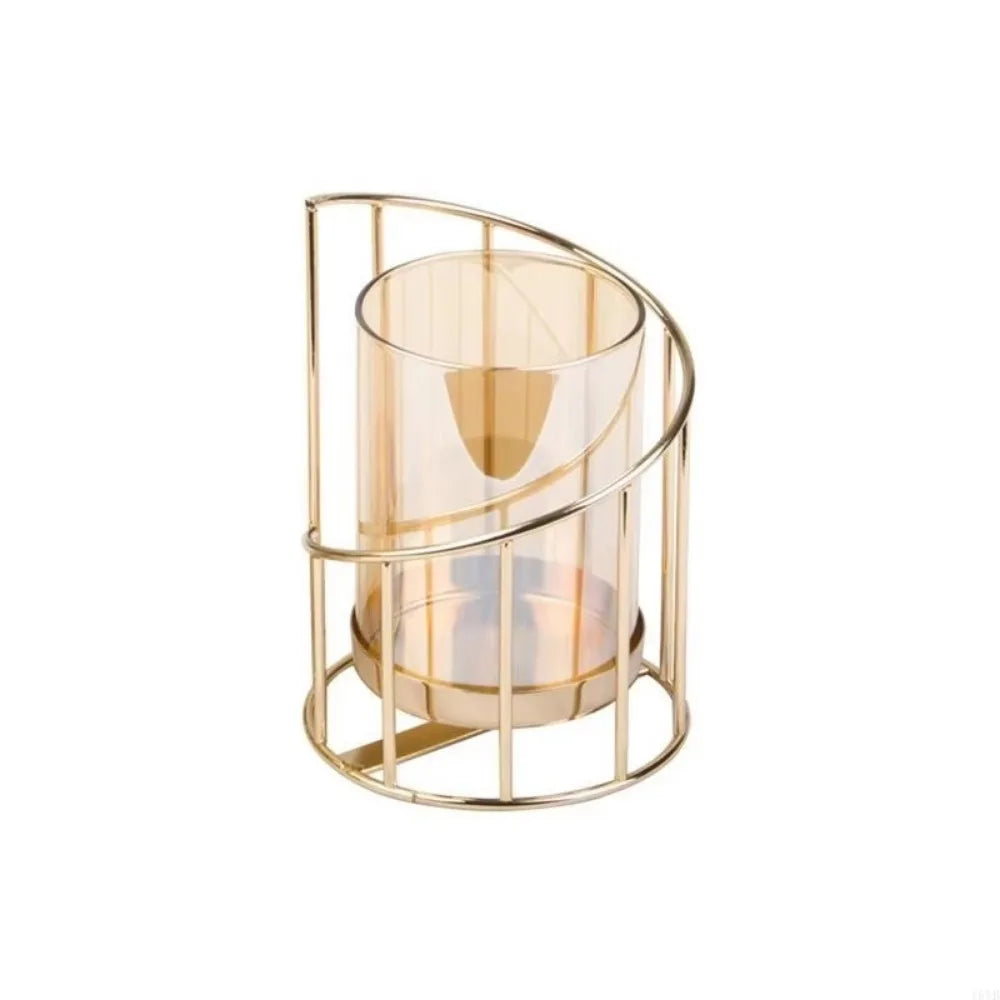 Elegant metal and glass candle holder with a wire frame and a clear glass cylinder.