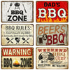 A collection of vintage metal tin signs featuring BBQ zone rules, warnings, and slogans like Dad's BBQ and Beer & BBQ.