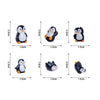 A set of cute cartoon penguin resin figurines in black and white for fairy garden or Christmas decor.
