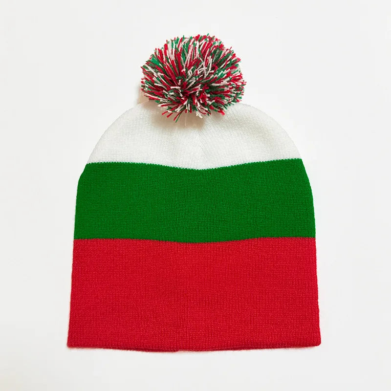 A knitted beanie in the colors of the flag of Russia, featuring a red and green horizontal stripe, with a festive pom-pom on 