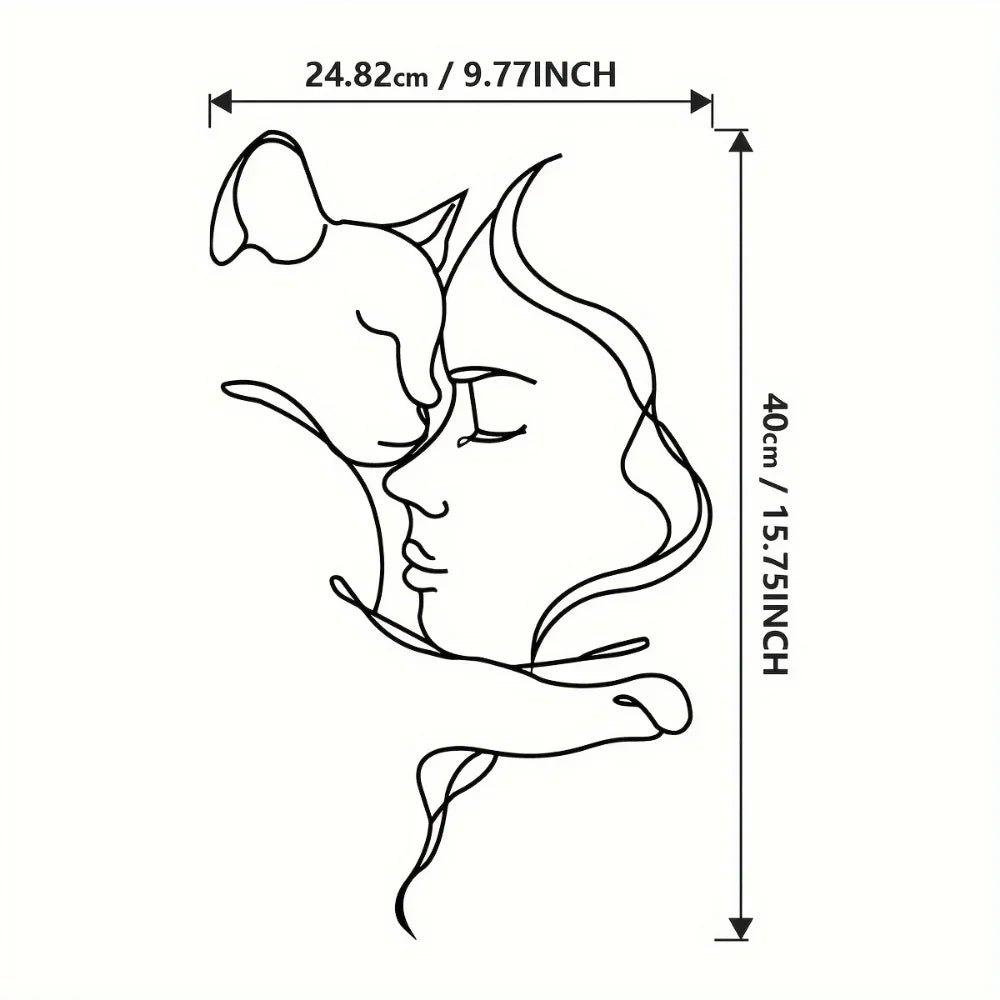 Black line drawing silhouette of a cat embracing a woman's face on a rectangular piece of art