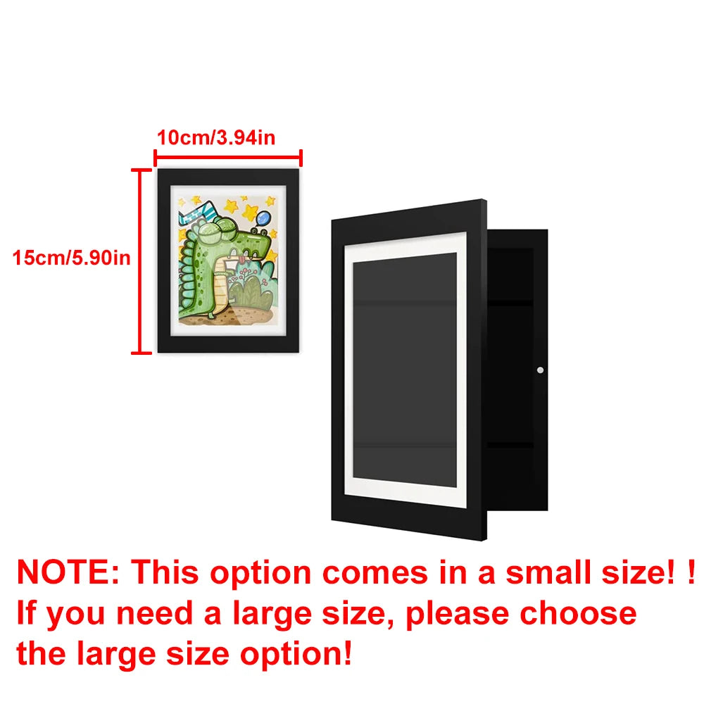 A black magnetic front opening art display frame with a green dinosaur illustration.