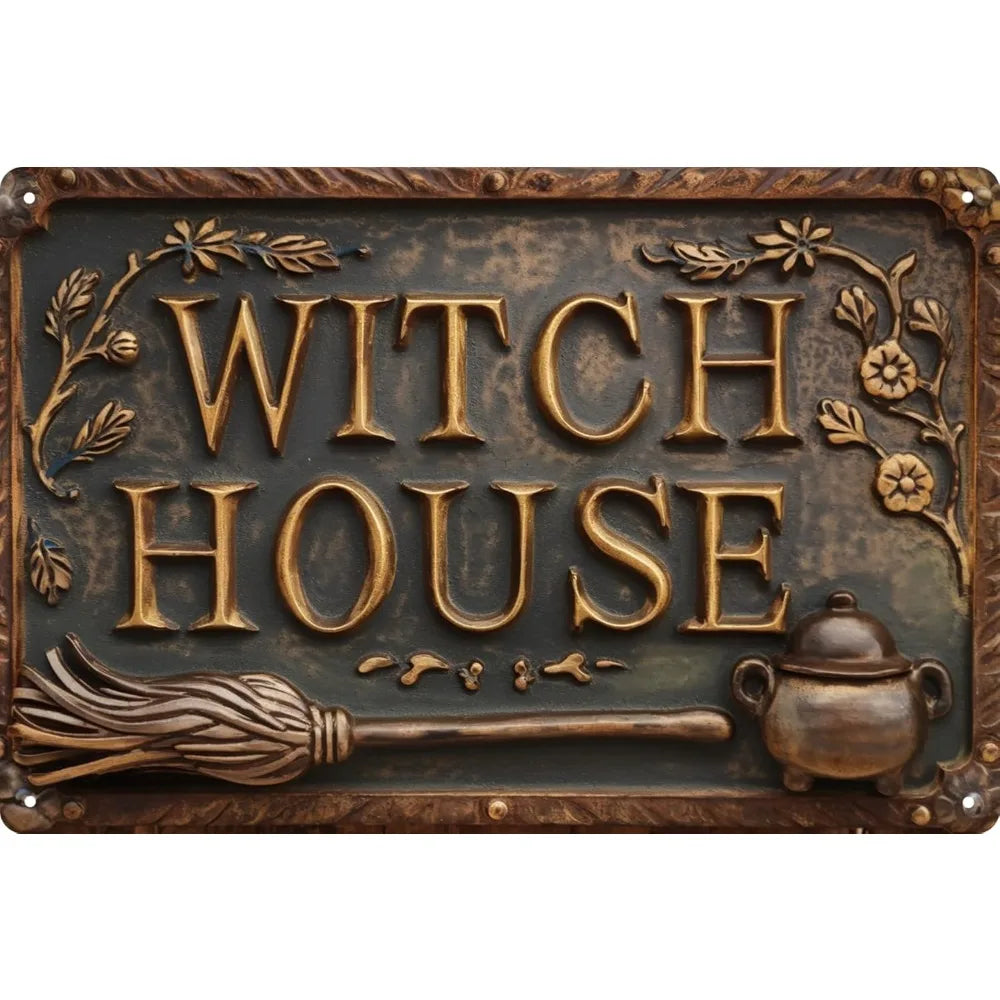 A vintage metal sign featuring the words WITCH HOUSE and a broomstick and cauldron design.