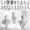 A collection of plaster bust miniatures depicting classical Greek mythology figures.