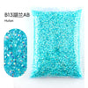 Bag of bright turquoise AB resin rhinestones for crafting