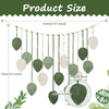 A collection of macrame leaf wall hangings in various shades of green and cream with tassels displayed against a white backgr