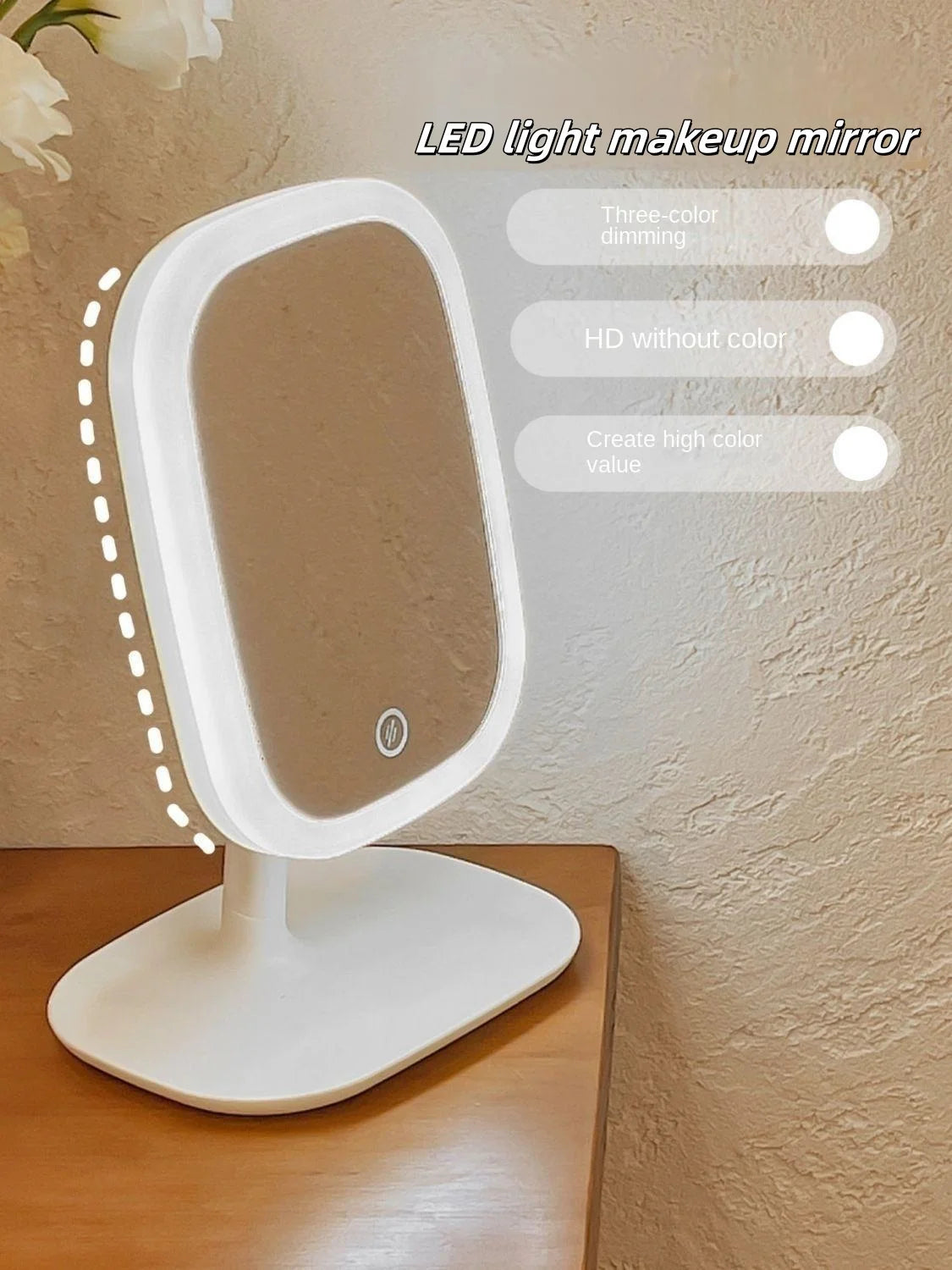 A white LED light makeup mirror is shown on a wooden surface with options for three-color dimming and HD without color.