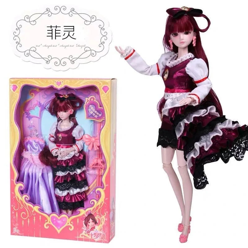 A detailed ball-jointed doll with elaborate makeup and a purple and black dress is shown next to its packaging.